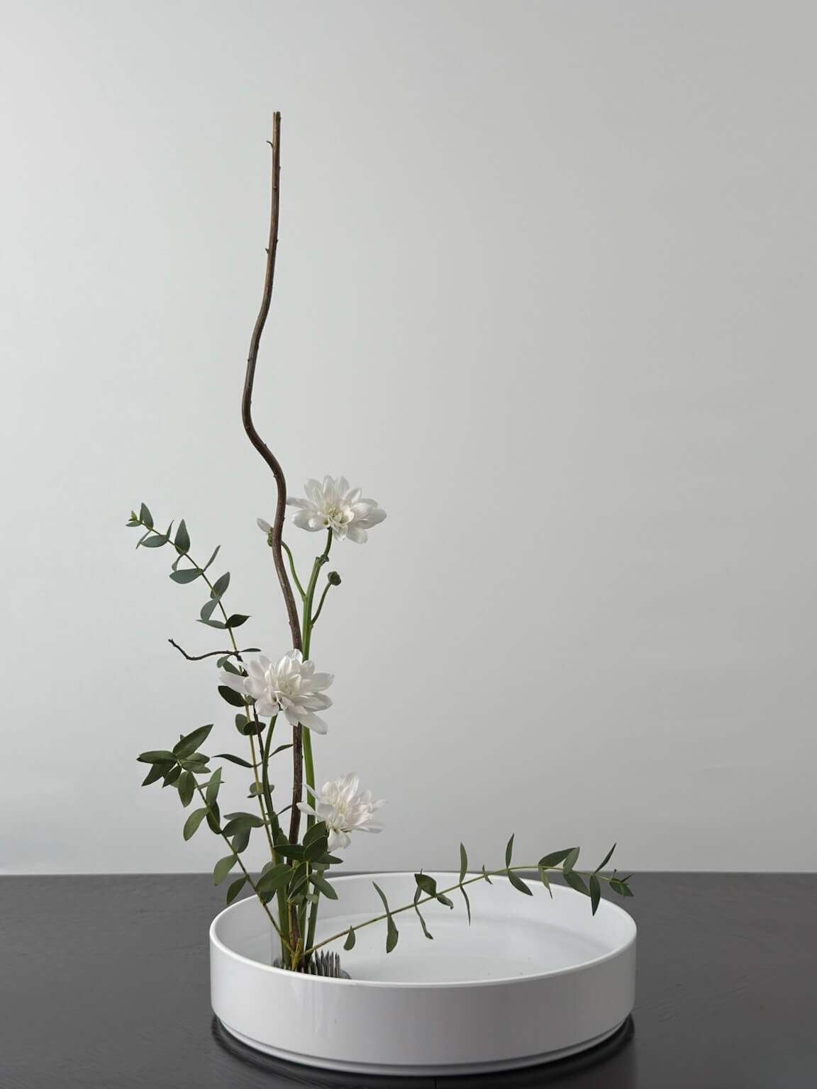 Beautiful Ikebana flower arrangements showcasing the Japanese art of floral design, created during workshops, private events, or in studio.