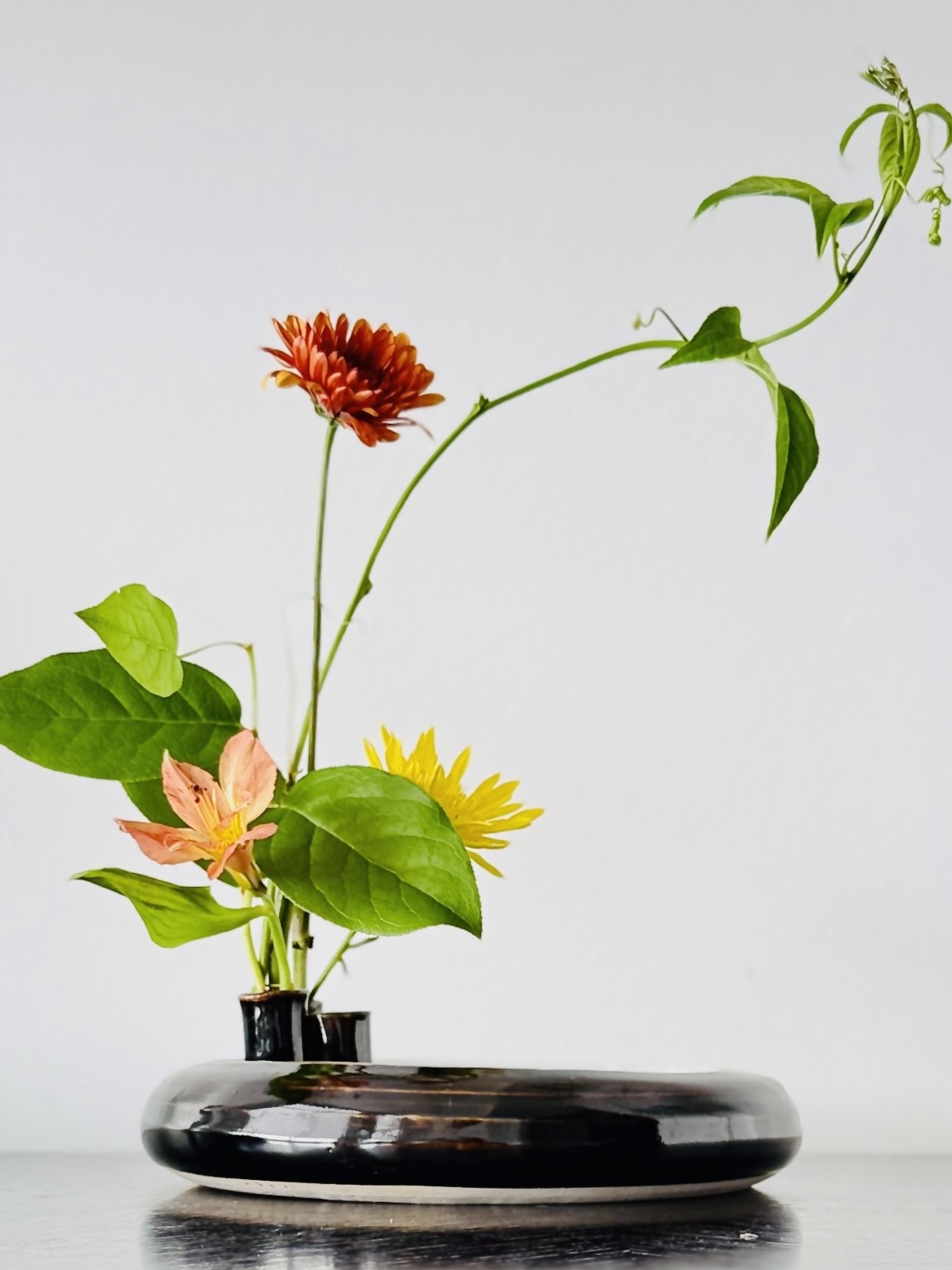 Beautiful Ikebana flower arrangements showcasing the Japanese art of floral design, created during workshops, private events, or in studio.