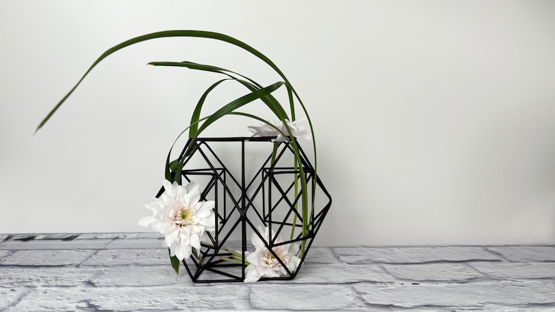A beautifully Ikebana flower arrangement that turns any corner into a conversation