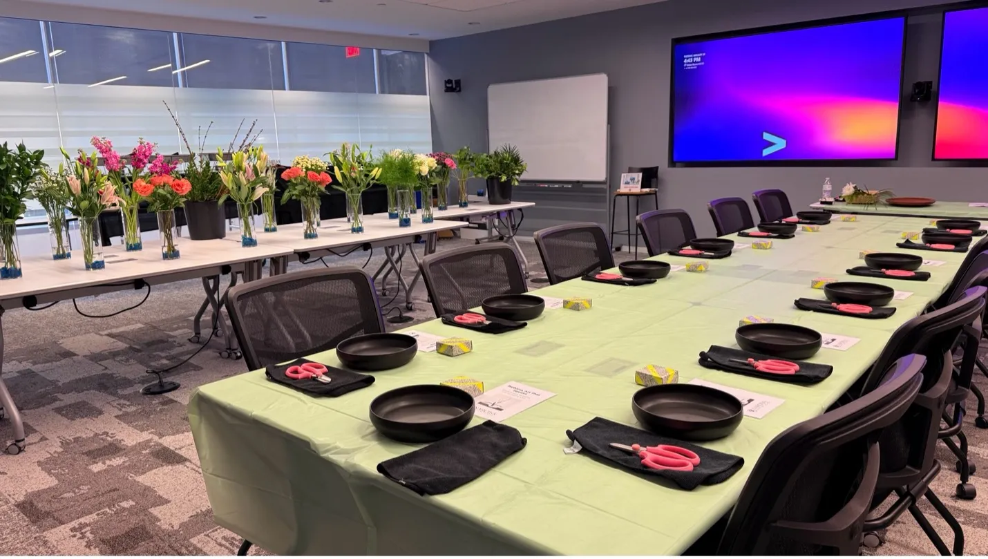 Corporate team displaying Ikebana arrangements after an employee appreciation event in the DMV